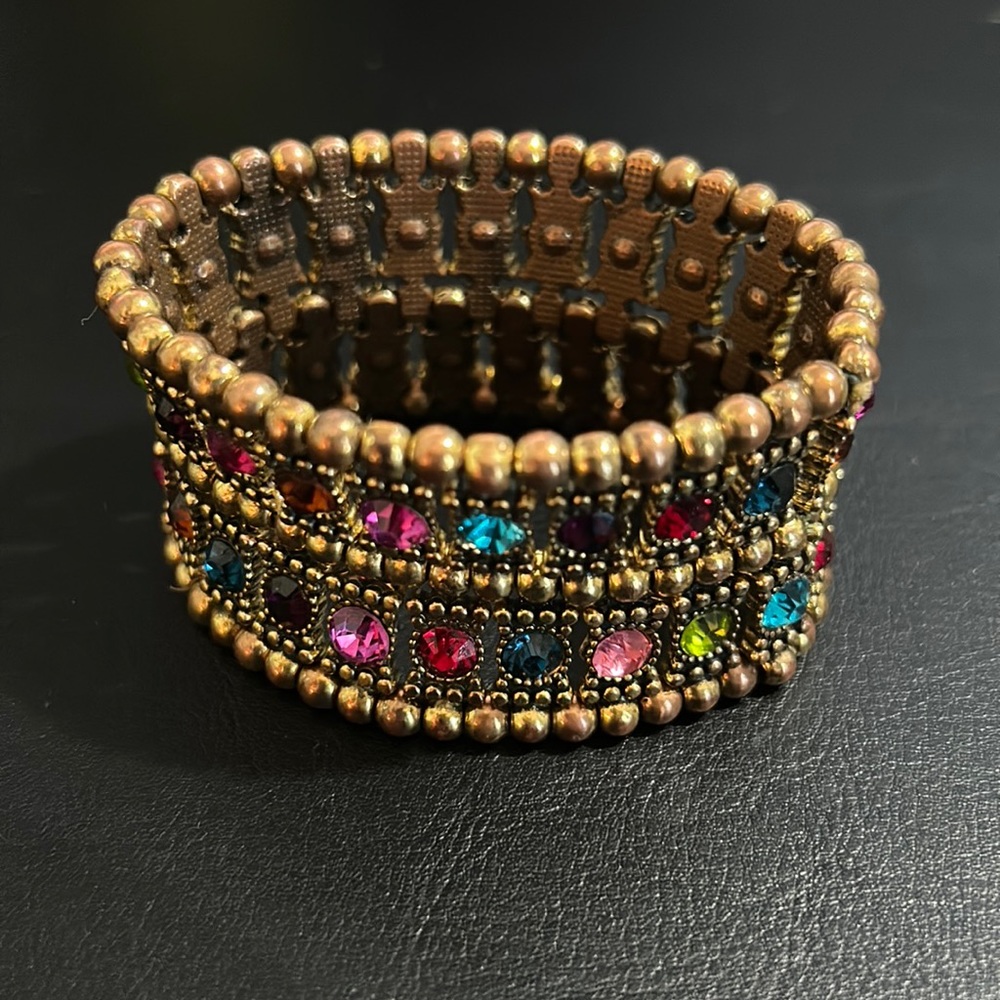3/$15 dark gold/multi rhinestone bracelet